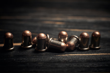 Flobert ammo 4mm close up on dark wooden dark backgroundの写真素材