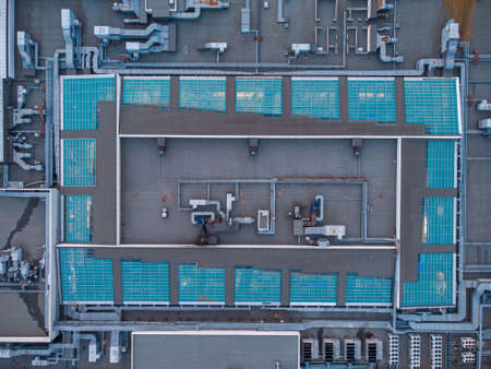 Aerial top view of a roof of a large shopping centerの写真素材