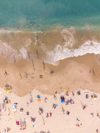 Aerial View From Flying Drone Of People Crowd Relaxing On Beach In Bulgaria