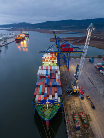 Aerial drone view of Large car cargo ship entering the port in Varnaの写真素材