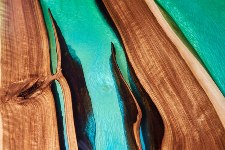 Texture of a wooden table with epoxy resin.の写真素材