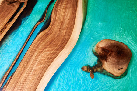 Texture of a wooden table with epoxy resin.の写真素材