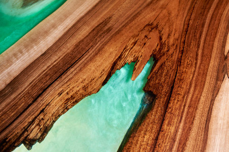Texture of a wooden table with epoxy resin.の写真素材