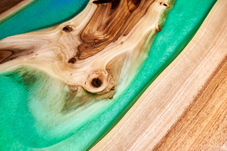 Texture of a wooden table with epoxy resin.の写真素材