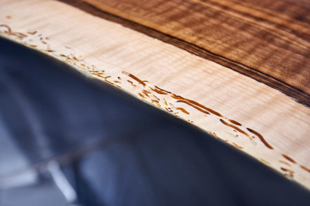 Texture of a wooden table with epoxy resin.