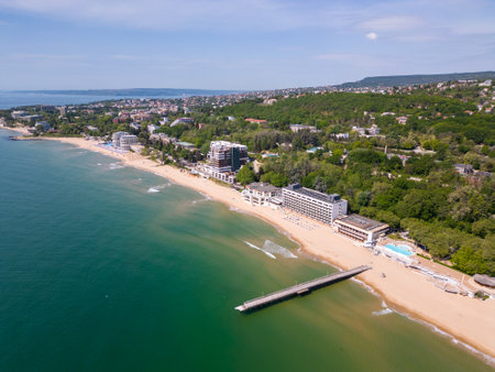 A stunning aerial top view of an exclusive residential complex nestled by the sea, boasting luxurious amenities and breathtaking oceanfront panoramas.の写真素材