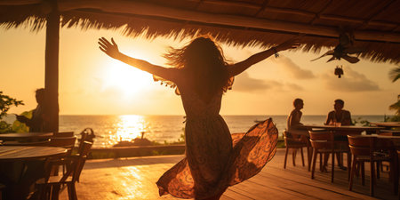 A beautiful woman gracefully dances in a beachside bar on a summer evening, effortlessly moving to the rhythm, radiating joy and capturing the essence of the magical seaside ambiance. AI Generative AIの素材