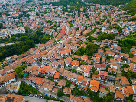 An aerial view of Veliko Tarnovo reveals a Bulgarian city rich in history and culture, with its beautiful buildings, streets, and picturesque hills.の写真素材