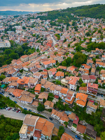 An aerial view of Veliko Tarnovo reveals a Bulgarian city rich in history and culture, with its beautiful buildings, streets, and picturesque hills.の写真素材