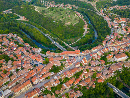 An aerial view of Veliko Tarnovo reveals a Bulgarian city rich in history and culture, with its beautiful buildings, streets, and picturesque hills.の写真素材