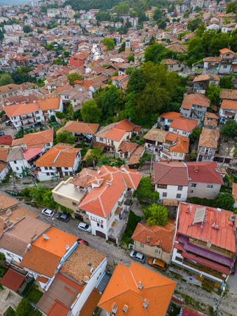 An aerial view of Veliko Tarnovo reveals a Bulgarian city rich in history and culture, with its beautiful buildings, streets, and picturesque hills.の写真素材
