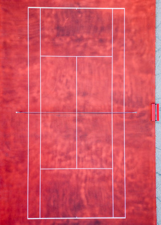 Top down aerial view of an empty tennis court, waiting for a game, no peopleの写真素材