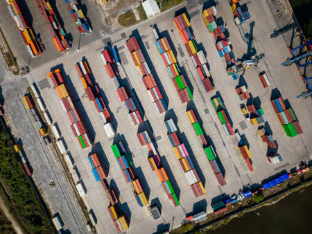 aerial view of a container terminal at the port, where massive containers await their journey