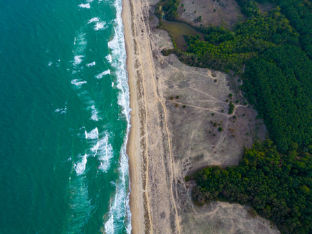 View from a flying drone over a deserted sea coastの写真素材