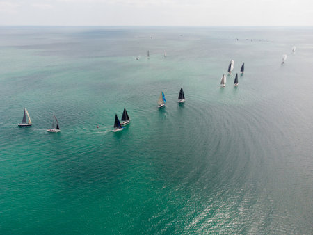 Aerial top view of sailing yachts regatta race on seaの写真素材