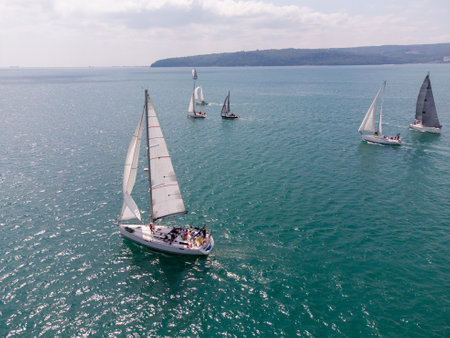 Aerial top view of sailing yachts regatta race on seaの写真素材
