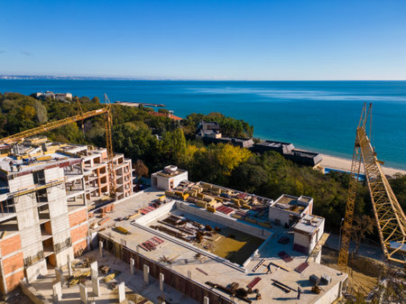 Aerial view of the construction of a massive beachfront hotelの写真素材