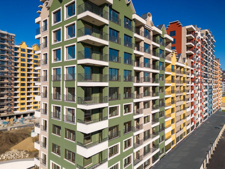 facade of a newly built residential building with bright colors.の写真素材