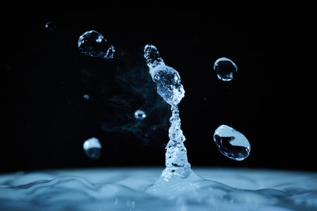 The process of boiling water, a stream of water shooting out of a humidifier or diffuser taken in...