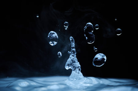 The process of boiling water, a stream of water shooting out of a humidifier or diffuser taken in close-up.の写真素材