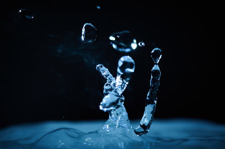 The process of boiling water, a stream of water shooting out of a humidifier or diffuser taken in...