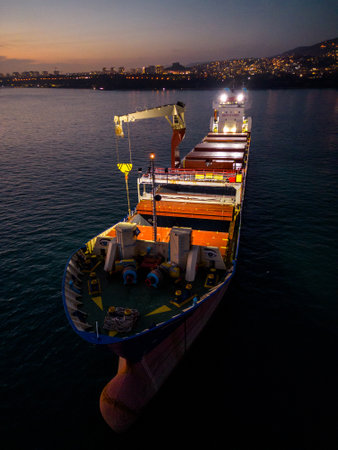 Aerial view cargo bulk carrier ship on the sea at night.の写真素材