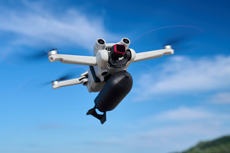 A civilian drone with a small bomb on board is flying in the sky