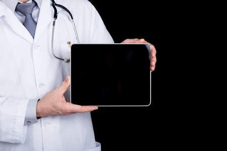 technology, internet and networking in medicine concept - Doctor holding a tablet pc with a blank...