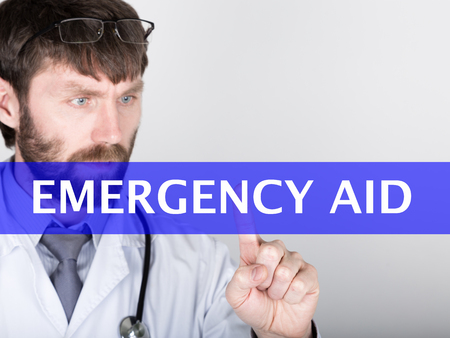 technology, internet and networking in medicine concept - medical doctor presses emergency aid...