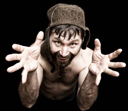 Dark portrait of scary evil sinister bearded man with smirk, makes various hand's signs and...