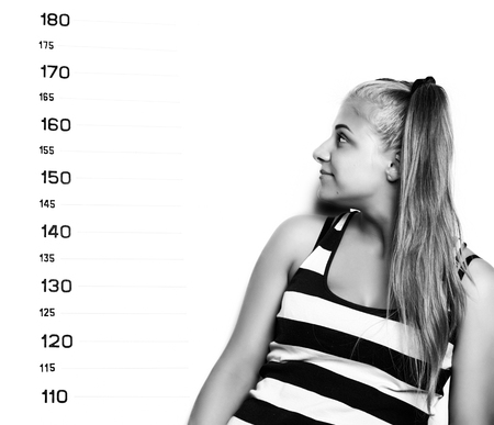 Young beautiful blonde woman Criminal Mug Shots. black and whiteの写真素材