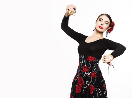 flamenco dancer on a light background. free space for your textの写真素材