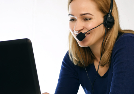 employee working in a call center. Headset telemarketing woman talking on helpline