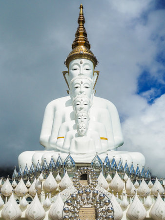 Wat Phra That Pha Sorn Kaew, Phetchabun Province. Photography Phetchabun big Buddha in sunny day. Wat Phra That Pha Sorn Kaew Temple is one of the most important and revered landmarks on Phetchabun white cloud in blue sky and mountain background.の写真素材
