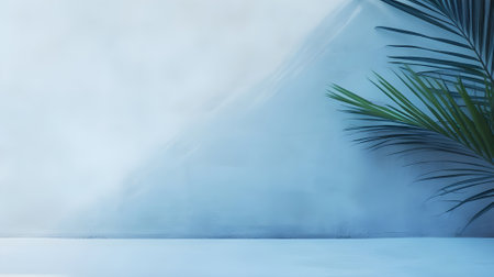 Empty palm shadow blue color texture pattern cement wall background. Summer tropical beach with minimal concept. Tropical palm leaves with shadow on blue background. Minimal nature. Summer Styled. Flat lay. Free copy space for text.の素材