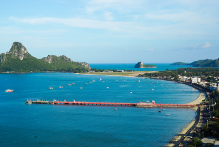 Aerial view of Prachuap Khiri Khan harbor southern of Thailand. Beautiful blue sea and green island with city and beach at Prachuap bay.の写真素材