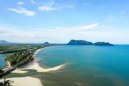Aerial view of Prachuap Khiri Khan harbor southern of Thailand. Beautiful blue sea and green island with city and beach at Prachuap bay.の写真素材