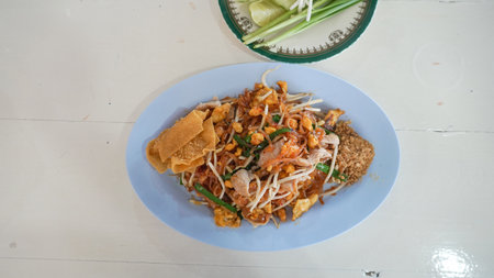 Pad thai or Phad thai is a stir-fried rice noodle dish. made from rice noodles, , bean sprouts,...