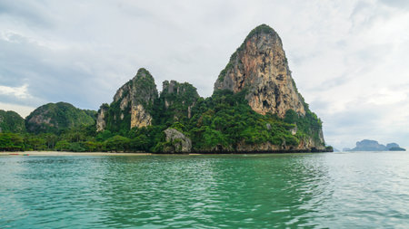 Long tail Boat at Railay Beach. Aerial view of Railay beach One of Thailand's most famous luxurious beach in summer sunny day in Krabi, Thailand.の写真素材