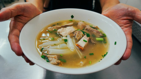 Tom Kuay Jap clear soup, Thai Street Food Menu. Paste of Rice Flour or Boiled Chinese Pasta Square...