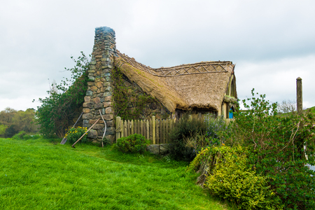 MATAMATA - New Zealand SEPTEMBER 12, 2014; Hobbit door in Hobbiton Movie set. Trademarks of Saul Zaentz Comp. and license by Ring Scenic Tours Ltd and Wingnut Films Productions Limited. Editorial useのeditorial素材