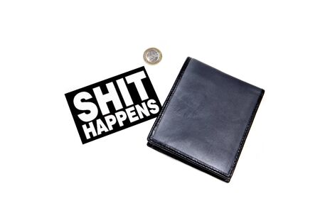 A shit happens sign next  to an empty wallet with only a euro left