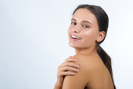 Beauty Girl. Portrait of Beautiful Young Woman Isolated on White Background.の写真素材
