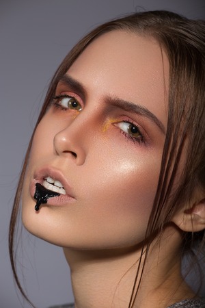 beauty creative makeup with black bread lipsの写真素材