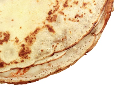 Russian pancakes closeup on a white backgroundの写真素材