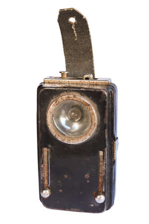 Old rusty chest mining flashlight isolated on whiteの写真素材