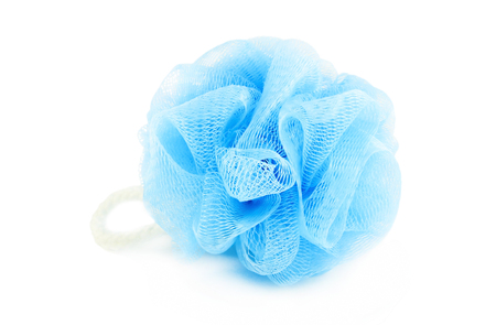 Soft blue synthetic sponge for showering isolated on whiteの写真素材