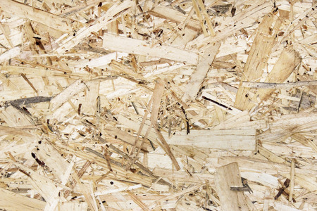 Wood-based panels, glued and pressed sawdust and shavings, as background
