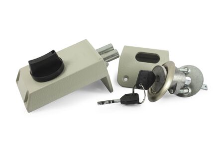 Mechanism of the door lock with the keys in the disassembled form Isolated on white