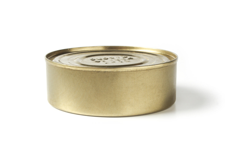 Metal can with canned goods isolated on white